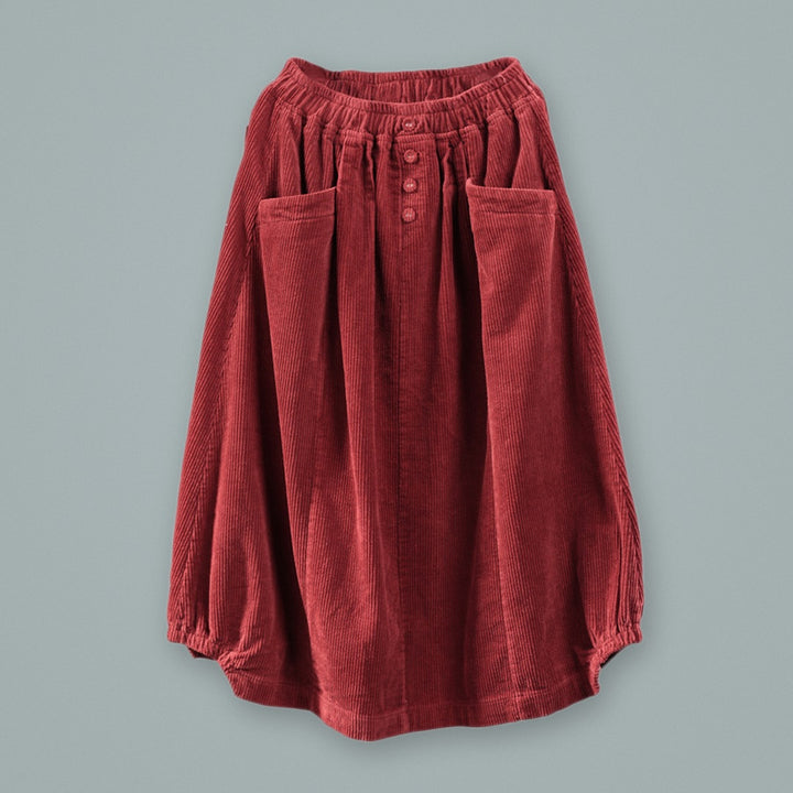 WREN corduroy midi skirt in Cranberry, flat lay with button and pocket details